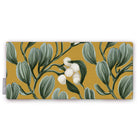 Gold Mistletoe Christmas table runner folded on white, showing sprigs of mistletoe with white berries