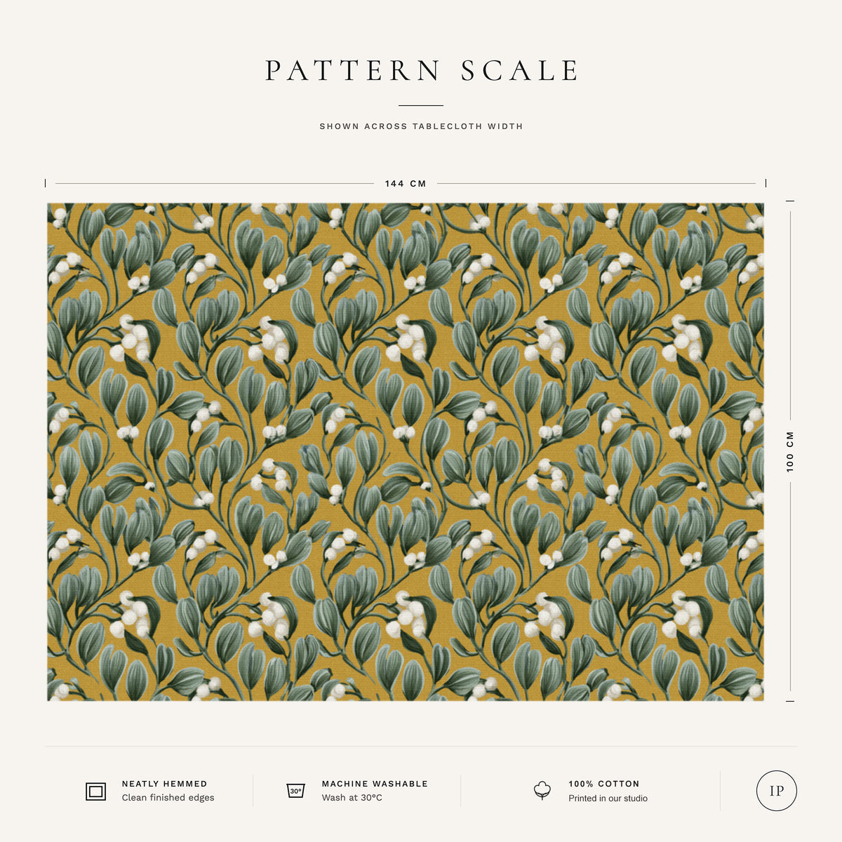 Pattern scale of the Mistletoe Christmas tablecloth in gold across its 144 cm width, with care notes