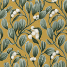 Close-up of the gold Mistletoe Christmas tablecloth print on cotton, showing sprigs of mistletoe with white berries