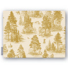 Fir Forest Toile Christmas tablecloth in gold on ivory, folded on white, showing fir trees, a rider and figures in the forest