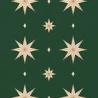 Close-up of the Stars Christmas table runner print in green and gold on cotton, showing large gold eight-pointed stars