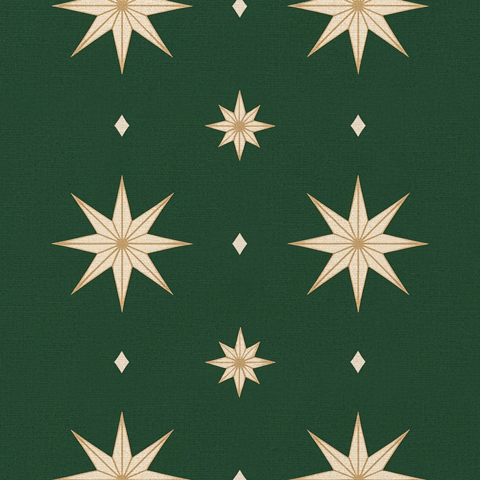 Close-up of the Stars Christmas table runner print in green and gold on cotton, showing large gold eight-pointed stars
