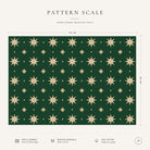 Pattern scale of the Stars Christmas tablecloth in green and gold across its 144 cm width, with care notes