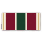 Signature Stripe Christmas table runner in green, burgundy and gold, folded on white, showing broad stripes