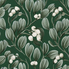 Close-up of the green Mistletoe Christmas napkin print on cotton, showing sprigs of mistletoe with white berries