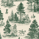 Close-up of the Fir Forest Toile Christmas napkin print in green on ivory cotton, showing fir trees and a rider