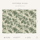 Pattern scale of the Pine Bough Christmas tablecloth in green on ivory across its 144 cm width, with care notes