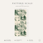 Pattern scale of the Village Toile Christmas table runner in green on ivory across its 44 cm width, with care notes