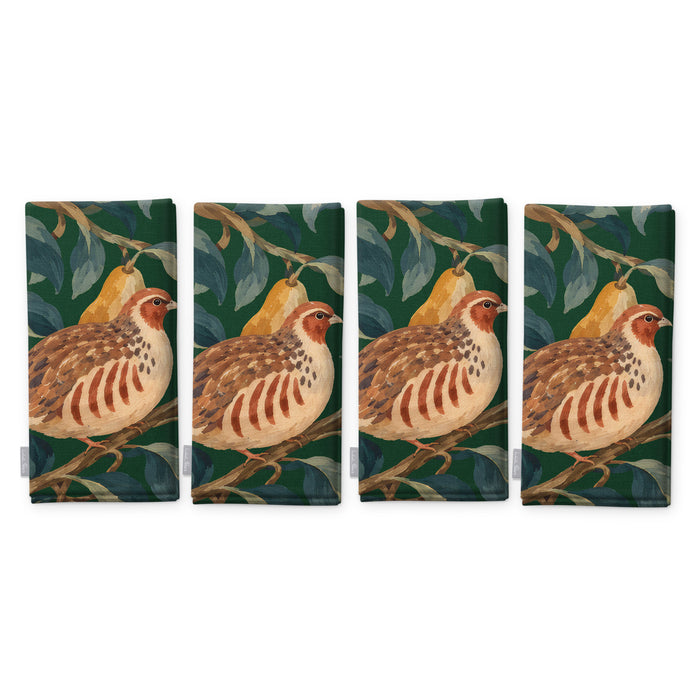Green Partridge and Pear Christmas napkins, set of four, folded on white, showing the same partridge among pears