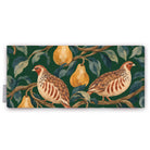 Green Partridge and Pear Christmas table runner folded on white, showing a partridge among pears and leaves