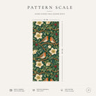 Pattern scale of the Robins and Christmas Roses Christmas table runner in green across its 44 cm width, with care notes