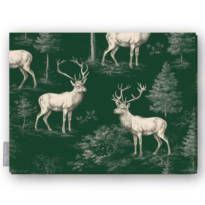 Green Stag Woodland Christmas tablecloth folded on white, showing two whole stags facing each other