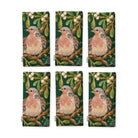 Green Turtle Doves and Mistletoe Christmas napkins, set of six, folded on white, showing the same turtle dove among mistletoe