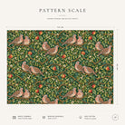 Pattern scale of the Turtle Doves and Mistletoe Christmas tablecloth in green across its 144 cm width, with care notes
