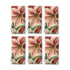 Ivory Amaryllis Christmas napkins, set of six, folded on white, showing the same amaryllis flower
