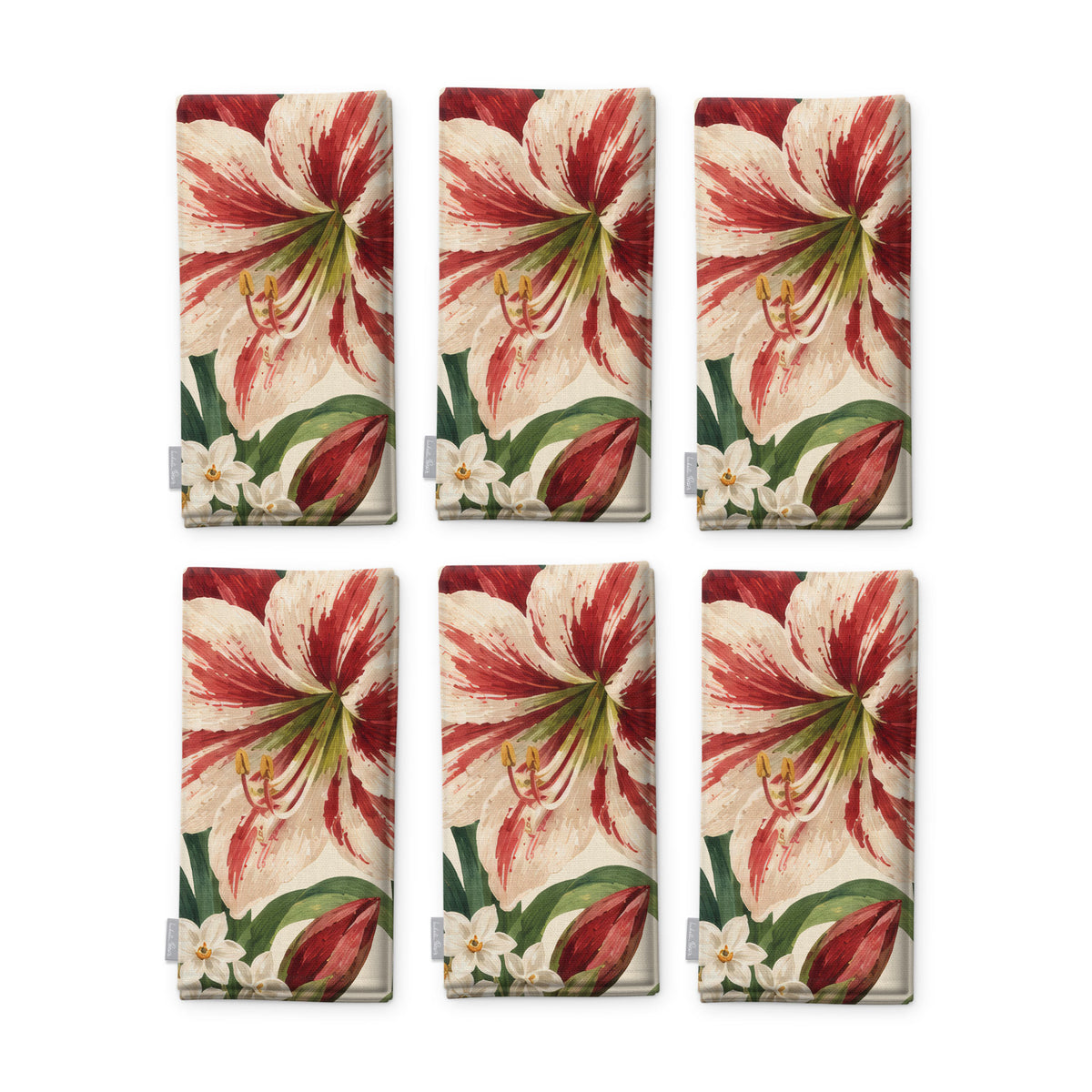 Ivory Amaryllis Christmas napkins, set of six, folded on white, showing the same amaryllis flower