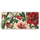 Ivory Amaryllis Christmas table runner folded on white, showing amaryllis flowers among long leaves