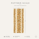 Pattern scale of the Gilded Ivy Christmas table runner in ivory and gold across its 44 cm width, with care notes