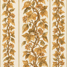 Close-up of the Gilded Ivy Christmas table runner print in ivory and gold on cotton, showing trails of gold ivy and berries
