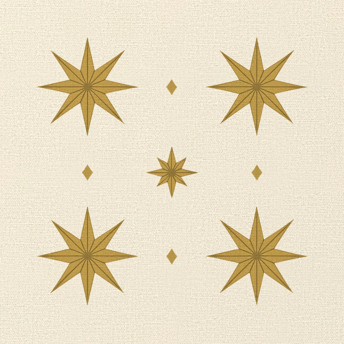 Close-up of the Stars Christmas napkin print in ivory and gold on cotton, showing gold eight-pointed stars