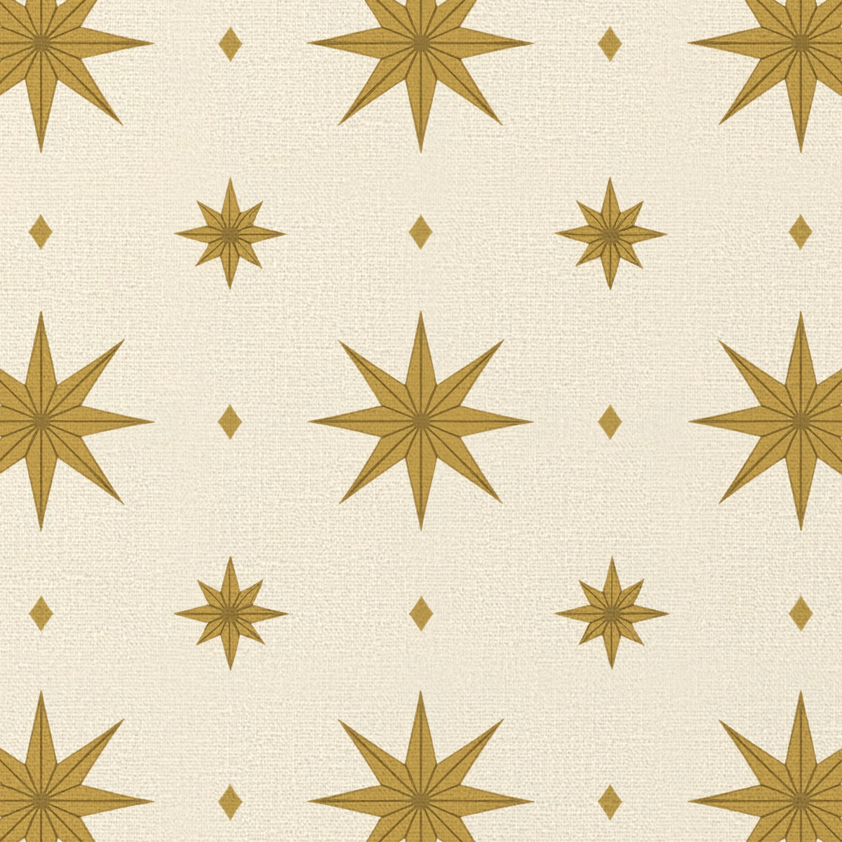 Close-up of the Stars Christmas tablecloth print in ivory and gold on cotton, showing gold eight-pointed stars