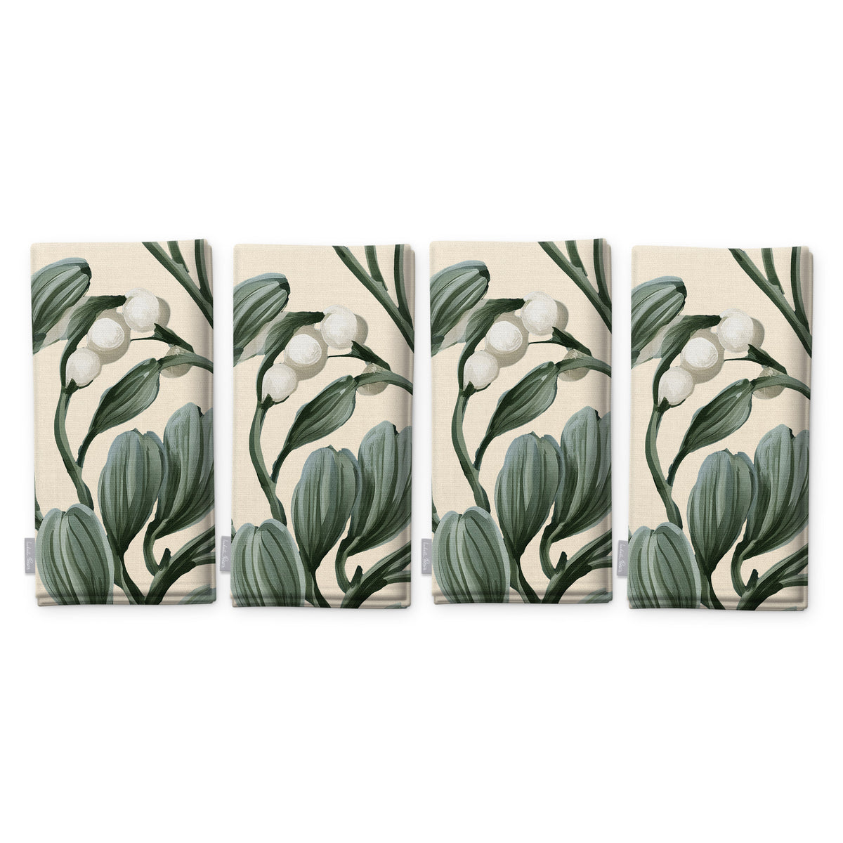 Ivory Mistletoe Christmas napkins, set of four, folded on white, showing the same sprig of mistletoe with white berries