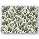 Ivory Mistletoe Christmas tablecloth folded on white, showing sprigs of mistletoe with white berries
