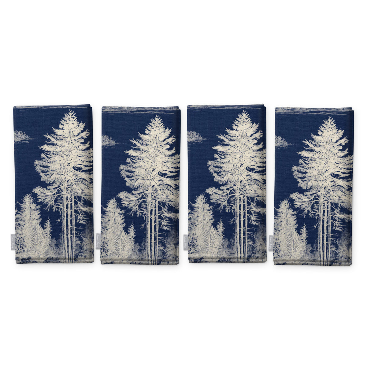 Fir Forest Toile Christmas napkins in ivory on navy, set of four folded napkins showing the same tall fir tree