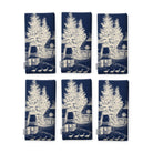 Village Toile Christmas napkins in ivory on navy, set of six, folded on white, showing the same fir tree and snowy cottage