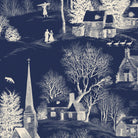 Close-up of the Village Toile Christmas table runner print in ivory on navy cotton, showing a snowy village
