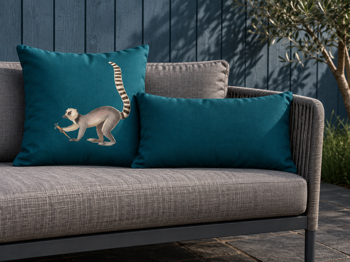 Teal Lemur and Signature Colours outdoor cushions on garden seating in a British courtyard