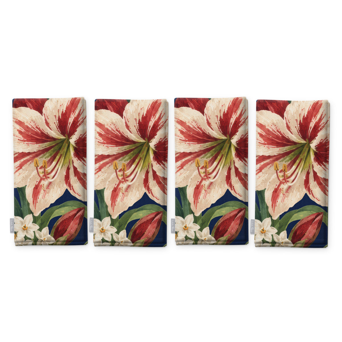 Navy Amaryllis Christmas napkins, set of four, folded on white, showing the same amaryllis flower