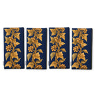 Gilded Ivy Christmas napkins in navy and gold, set of four folded napkins showing the same trail of gold ivy and berries