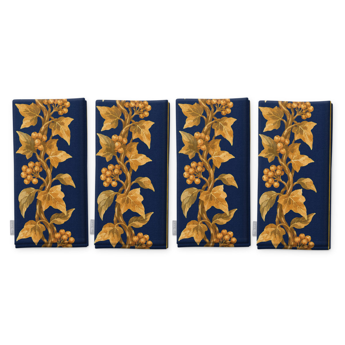 Gilded Ivy Christmas napkins in navy and gold, set of four folded napkins showing the same trail of gold ivy and berries