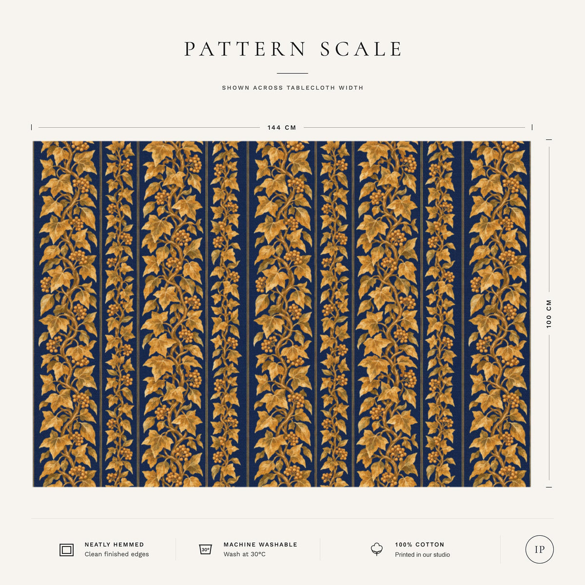 Pattern scale of the Gilded Ivy Christmas tablecloth in navy and gold across its 144 cm width, with care notes