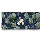Navy Mistletoe Christmas table runner folded on white, showing sprigs of mistletoe with white berries