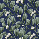 Close-up of the navy Mistletoe Christmas table runner print on cotton, showing sprigs of mistletoe with white berries