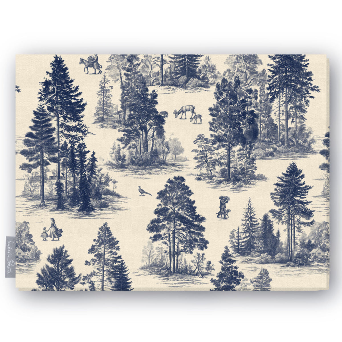 Fir Forest Toile Christmas tablecloth in navy on ivory, folded on white, showing fir trees, a rider and figures in the forest