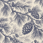 Close-up of the Pine Bough Christmas tablecloth print in navy on ivory cotton, showing pine boughs and cones