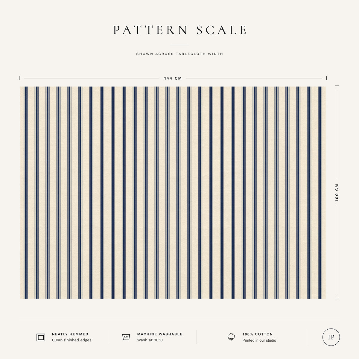 Pattern scale of the Ticking Stripe Christmas tablecloth in navy on ivory across its 144 cm width, with care notes