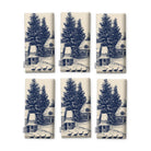 Village Toile Christmas napkins in navy on ivory, set of six, folded on white, showing the same fir tree and snowy cottage