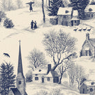 Close-up of the Village Toile Christmas table runner print in navy on ivory cotton, showing a snowy village