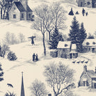 Close-up of the Village Toile Christmas tablecloth print in navy on ivory cotton, showing a snowy village