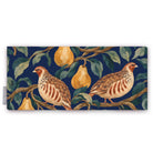 Navy Partridge and Pear Christmas table runner folded on white, showing a partridge among pears and leaves