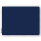 Plain navy cotton Christmas tablecloth folded on white
