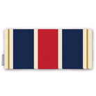 Signature Stripe Christmas table runner in navy, red and burgundy, folded on white, showing broad stripes