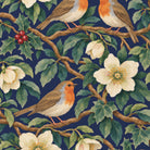 Close-up of the navy Robins and Christmas Roses table runner print on cotton, showing a Christmas rose and two robins