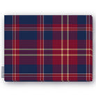 Navy tartan Christmas tablecloth folded on a white background, navy and burgundy with fine ivory and gold lines