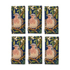 Navy Turtle Doves and Mistletoe Christmas napkins, set of six, folded on white, showing the same turtle dove among mistletoe