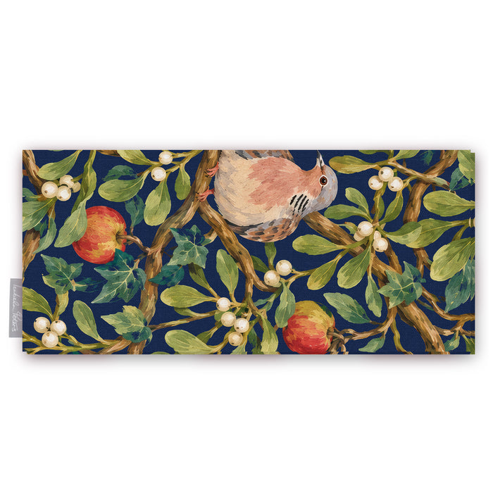 Navy Turtle Doves and Mistletoe Christmas table runner folded on white, showing a turtle dove among mistletoe and red apples